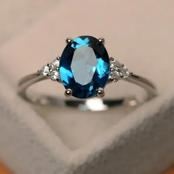 1/2 CT. TW. SWISS BLUE  ZIRCON AND LAB-CREATED DIAMOND RING IN S925 - Picture 3 of 3